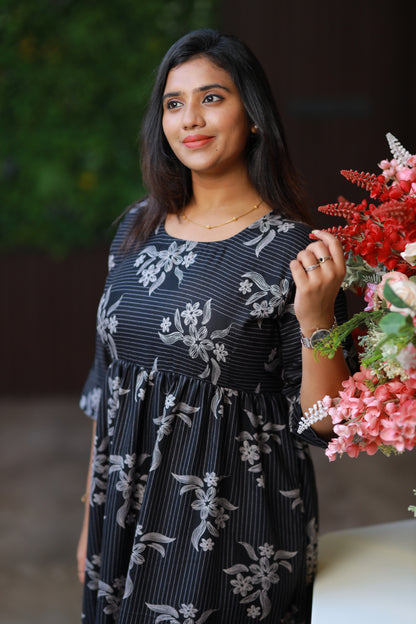 Alphine Black floral design center zip frock