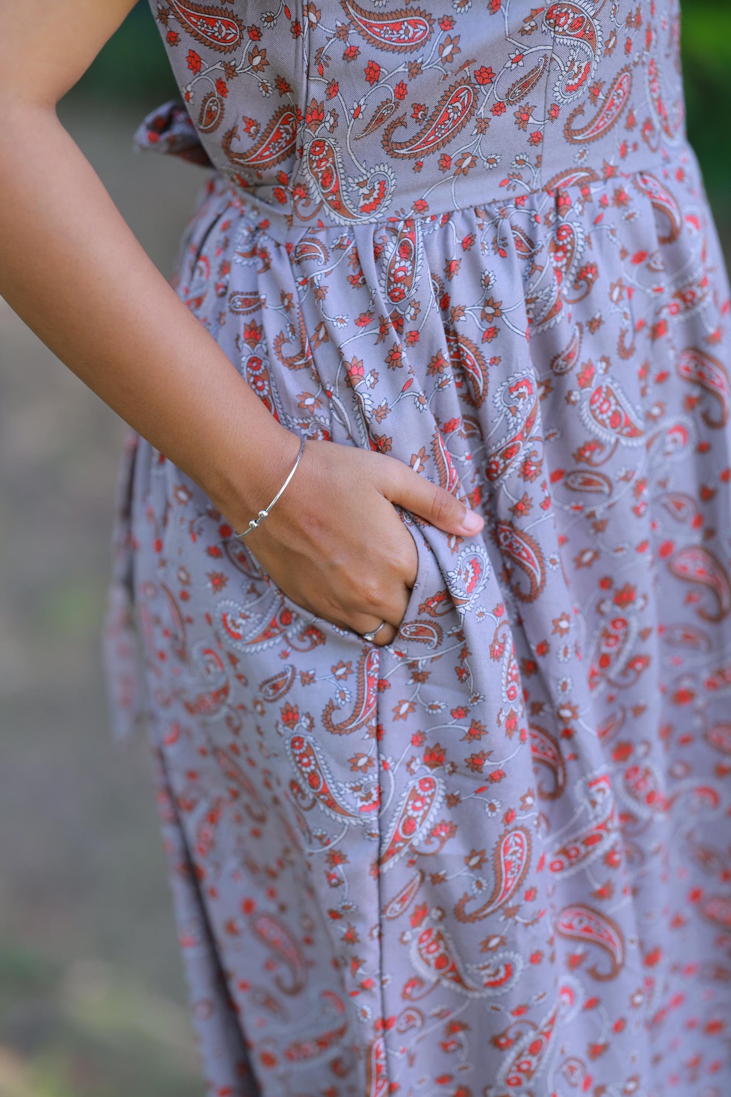 Greay with Brown and Red Floral design Alphine Center zip Frock
